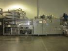 Used KHS Kisters, Model 601P Tray Shrink Wrap Bundler for printed film with 24 in. x 10 ft. x 15 in. High Shrink Tunnel. Has Allen-Bradley Logix 5555 PLC and Panelview 550 touch screen controls. Elec...