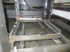 Used KHS Kisters, Model 601P Tray Shrink Wrap Bundler for printed film with 24 in. x 10 ft. x 15 in. High Shrink Tunnel. Has Allen-Bradley Logix 5555 PLC and Panelview 550 touch screen controls. Elec...