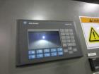 Used KHS Kisters, Model 601P Tray Shrink Wrap Bundler for printed film with 24 in. x 10 ft. x 15 in. High Shrink Tunnel. Has Allen-Bradley Logix 5555 PLC and Panelview 550 touch screen controls. Elec...