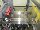 Used Multipack Model F-40 Carton Multi-Pack Stretch Or Shrink Film Bundler. Bundled package size range of Length- 30mm-350mm, Width- 12mm -200.., Height- 50mm -300. Cartons are received on infeed bel...