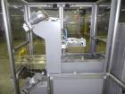 Used Multipack Model F-40 Carton Multi-Pack Stretch Or Shrink Film Bundler. Bundled package size range of Length- 30mm-350mm, Width- 12mm -200.., Height- 50mm -300. Cartons are received on infeed bel...