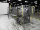 Used Omega Design Model DL-36 Dual Lane High Speed Shrink Bundler. Capable of speeds from 200 - 240 containers per minute. Is of stainless steel construction. Max product height: up to 11
