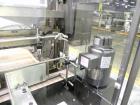 Used Omega Design Model DL-36 Dual Lane High Speed Shrink Bundler. Capable of speeds from 200 - 240 containers per minute. Is of stainless steel construction. Max product height: up to 11