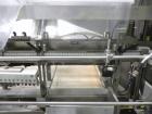 Used Omega Design Model DL-36 Dual Lane High Speed Shrink Bundler. Capable of speeds from 200 - 240 containers per minute. Is of stainless steel construction. Max product height: up to 11