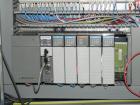 Used Omega Design Model DL-36 Dual Lane High Speed Shrink Bundler. Capable of speeds from 200 - 240 containers per minute. Is of stainless steel construction. Max product height: up to 11