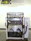 Used Omega Design Model DL-27 Dual Lane Shrink Bundler. Capable of speeds from 200 to 240 BPM (depending on product size and pattern). Has a Max film width of 26