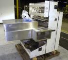 Used Omega Design Model DL-27 Dual Lane Shrink Bundler. Capable of speeds from 200 to 240 BPM (depending on product size and pattern). Has a Max film width of 26