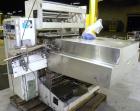 Used Omega Design Model DL-27 Dual Lane Shrink Bundler. Capable of speeds from 200 to 240 BPM (depending on product size and pattern). Has a Max film width of 26