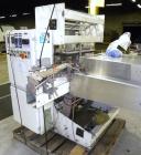 Used Omega Design Model DL-27 Dual Lane Shrink Bundler. Capable of speeds from 200 to 240 BPM (depending on product size and pattern). Has a Max film width of 26