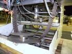 Used Omega Design Model DL-27 Dual Lane Shrink Bundler. Capable of speeds from 200 to 240 BPM (depending on product size and pattern). Has a Max film width of 26