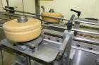 Used Omega Design Model DL-27 Dual Lane Multi-Pack Shrink Bundler. All stainless steel construction with Lexan type interlocked guarding. “Inline / Offset” infeed, utilizing single lane parallel dire...