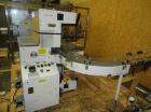 Used Omega Design Model SL-18 Shrink Bundler capable of speeds from 120 - 150 containers per minute depending on container size and pack pattern. Single lane unit with right angle infeed and integrat...