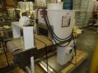Used Omega Design Model SL-18 Shrink Bundler capable of speeds from 120 - 150 containers per minute depending on container size and pack pattern. Single lane unit with right angle infeed and integrat...