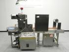 Used Omega Design Model SL-18 Single Lane Shrink Bundler. Machine is capable of speeds from 120 to 150 containers per minute. Has right angle infeed and integrated heat shrink tunnel. Has a maximum f...
