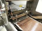 Used Omega Design Model SL-18 Single Lane Shrink Bundler. Machine is capable of speeds from 120 to 150 containers per minute. Has right angle infeed and integrated heat shrink tunnel. Has a maximum f...