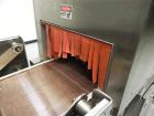 Used Omega Design Model SL-18 Single Lane Shrink Bundler. Machine is capable of speeds from 120 to 150 containers per minute. Has right angle infeed and integrated heat shrink tunnel. Has a maximum f...