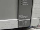 Used Omega Design Model SL-18 Single Lane Shrink Bundler. Machine is capable of speeds from 120 to 150 containers per minute. Has right angle infeed and integrated heat shrink tunnel. Has a maximum f...