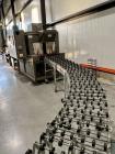 Used PMI SIB-30 Automatic Inline Shrink Bundler with Tunnel – 30 PPM, AB Controls, Film Rolls Included