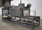 Used PMI (Arpac) Model SIB-35 Automatic Inline Shrink Bundler. Capable of speeds up to 30 bundles per minute (depending on application). Has a 35