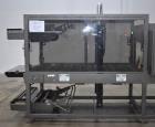 Used PMI (Arpac) Model SIB-35 Automatic Inline Shrink Bundler. Capable of speeds up to 30 bundles per minute (depending on application). Has a 35