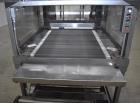 Used PMI (Arpac) Model SIB-35 Automatic Inline Shrink Bundler. Capable of speeds up to 30 bundles per minute (depending on application). Has a 35