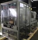 Used PMI Model SIC-30 Automatic Shrink Bundler & Shrink Tunnel. Machine is rated at up to 30 packages per minute. Tray wrapper has a30
