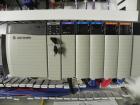 Used PMI Model SIC-30 Automatic Shrink Bundler & Shrink Tunnel. Machine is rated at up to 30 packages per minute. Tray wrapper has a30