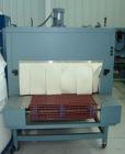 Used-Used: Shanklin B2BB shrink wrapper bundler with Shanklin T-9 shrink tunnel. Has 40 in seal jaw, AB Micrologics 1000 plc...