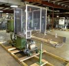 Used Skinetta Shrink Bundler, Model ASK300. Has a web width of 290mm. Maximum infeed width 380mm. Maximum height 290mm. Maximum length 350mm. Has a Z infeed, rear feed, to cross push to push straight...