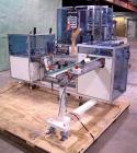 Used Skinetta ASK 450T Shrink Bander/Bundler. Capable of speeds from 10 to 40 cycles per minute. Has inline feed and optional right angle carton collator. Max 450mm web width. Has upstacker. Last use...