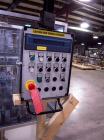 Used Skinetta ASK 450T Shrink Bander/Bundler. Capable of speeds from 10 to 40 cycles per minute. Has inline feed and optional right angle carton collator. Max 450mm web width. Has upstacker. Last use...