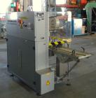 Used Skinetta Automatic Stretch Banding/ Shrink Bundle Machine, Model ASK200B, Serial #2517.02. Capable of speeds up to 20 cycles per minute. Will handle working film web width of 200 mm. Handles PE ...