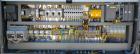 Used Skinetta Automatic Stretch Banding/ Shrink Bundle Machine, Model ASK200B, Serial #2517.02. Capable of speeds up to 20 cycles per minute. Will handle working film web width of 200 mm. Handles PE ...
