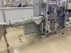 Used Skinetta (Christ Packaging) Model ASK2500 Shrink Bundler with Shrink Tunnel. Capable of speeds up to 40 cycles per minute. Maximum sealing width: up to 230mm. Maximum bundle height: up to 240mm....