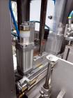 Used Skinetta (Christ Packaging) Model ASK300 Automatic single lane stretch/shrink film bundler. Capable of speeds up to 32 cycles per minute. Capable of a product size range (length) 75mm - 290mm (w...