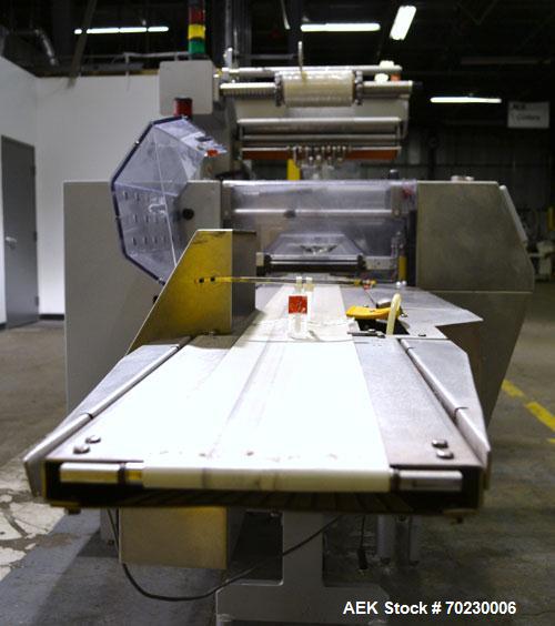 Used Bosch Doboy Model Linium 315 Horizontal Flow Wrapper. Machine is of stainless steel construction, rated up to 350 packages/minute, 8' long in line indexing feed conveyor with 5" pitch, SealStrip...