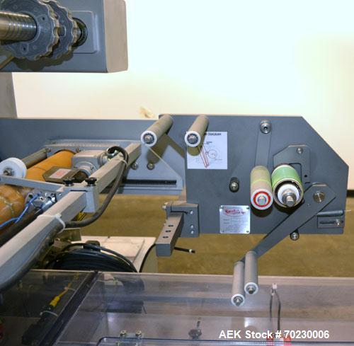 Used Bosch Doboy Model Linium 315 Horizontal Flow Wrapper. Machine is of stainless steel construction, rated up to 350 packages/minute, 8' long in line indexing feed conveyor with 5" pitch, SealStrip...