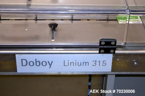 Used Bosch Doboy Model Linium 315 Horizontal Flow Wrapper. Machine is of stainless steel construction, rated up to 350 packages/minute, 8' long in line indexing feed conveyor with 5" pitch, SealStrip...
