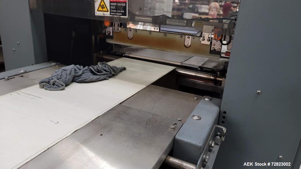 Shanklin F4A. Continuous Motion Horizontal Lap Seal Shrink Wrapper.