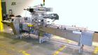Used Bosch Doboy Model Linium 315 Horizontal Flow Wrapper. Machine is of stainless steel construction, rated up to 350 packages/minute, 8' long in line indexing feed conveyor with 5