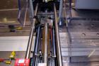 Used Bosch Doboy Model Linium 315 Horizontal Flow Wrapper. Machine is of stainless steel construction, rated up to 350 packages/minute, 8' long in line indexing feed conveyor with 5