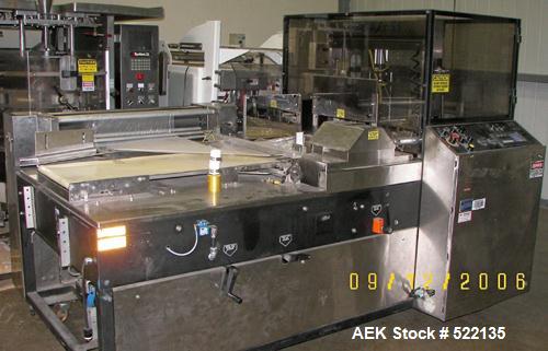USED: API Lantech model Versajet 2200 SS automatic continuous motion side seal shrink wrapper. All stainless steel contact parts, knife cut off, scrap rewind, pinhole perforator. Uses center folded f...