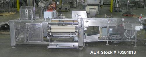 Used APM Model MS3-18SS Horizontal Shrink Wrapper capable of speeds up to 180 packages per minute.  Has a seal bar width of 18".  Machine is of stainless steel construction.  Has roller conveyor and ...