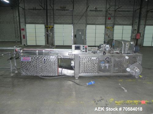 Used APM Model MS3-18SS Horizontal Shrink Wrapper capable of speeds up to 180 packages per minute.  Has a seal bar width of 18".  Machine is of stainless steel construction.  Has roller conveyor and ...