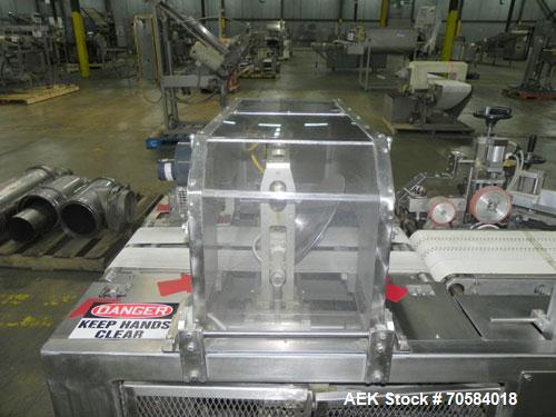 Used APM Model MS3-18SS Horizontal Shrink Wrapper capable of speeds up to 180 packages per minute.  Has a seal bar width of 18".  Machine is of stainless steel construction.  Has roller conveyor and ...