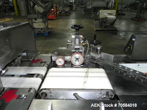 Used APM Model MS3-18SS Horizontal Shrink Wrapper capable of speeds up to 180 packages per minute.  Has a seal bar width of 18".  Machine is of stainless steel construction.  Has roller conveyor and ...