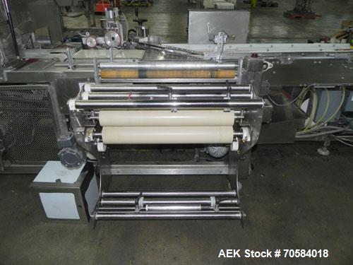 Used APM Model MS3-18SS Horizontal Shrink Wrapper capable of speeds up to 180 packages per minute.  Has a seal bar width of 18".  Machine is of stainless steel construction.  Has roller conveyor and ...