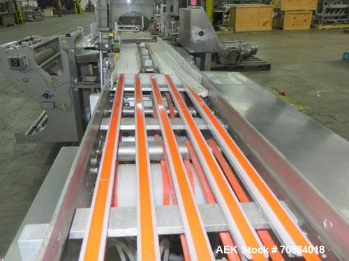 Used APM Model MS3-18SS Horizontal Shrink Wrapper capable of speeds up to 180 packages per minute.  Has a seal bar width of 18".  Machine is of stainless steel construction.  Has roller conveyor and ...
