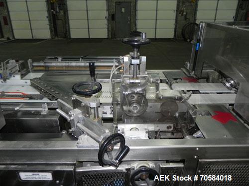 Used APM Model MS3-18SS Horizontal Shrink Wrapper capable of speeds up to 180 packages per minute.  Has a seal bar width of 18".  Machine is of stainless steel construction.  Has roller conveyor and ...