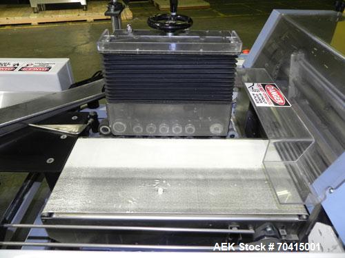 Used Conflex RSW 160 Advantedge Rotary Horizontal Side Seal Shrink Wrapper. Machine is registration capable, and can perform at speeds up to 200 packages per minute. Has a 16" wide seal jaw and a pac...
